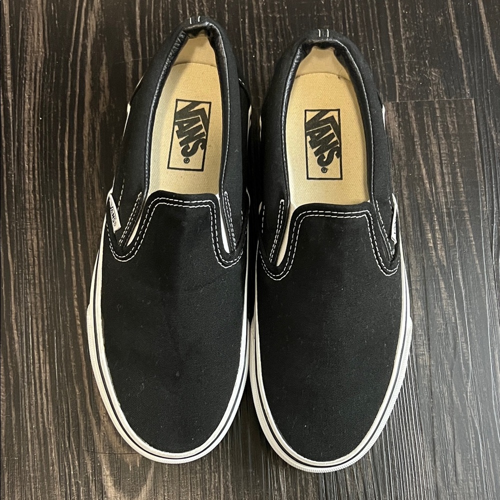Vans Black Canvas Slip-Ons with White Trim